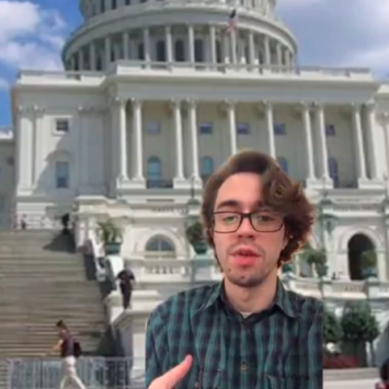 A person is green-screened in front of the Capitol building in DC